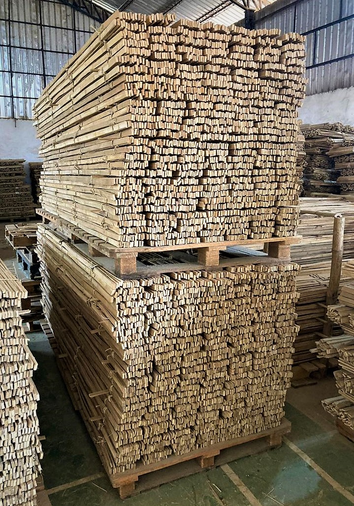 Pallets of cut bamboo slats stacked at the BPL warehouse